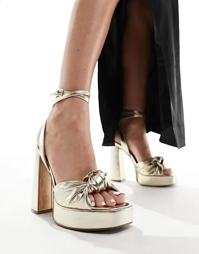 Wide Fit Nikita knotted platform heeled sandals in gold