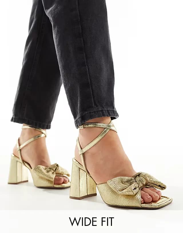 Wide Fit Hitched bow detail mid block heeled sandals in gold