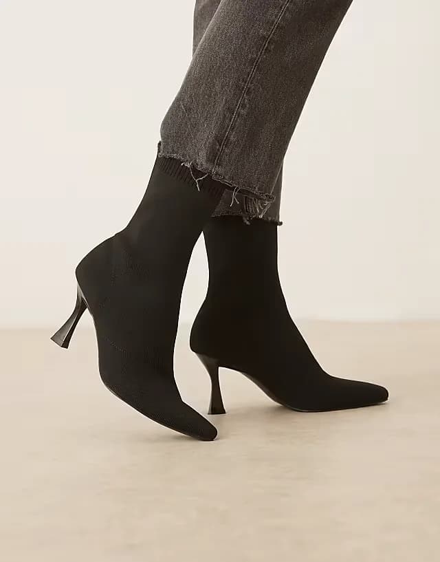 Reagan chisel toe sock boots in black knit